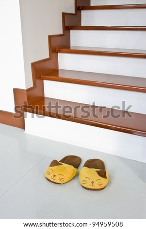 slippers under stair
