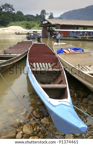 Rows of long boat at Taman Negara National Park, Malaysia