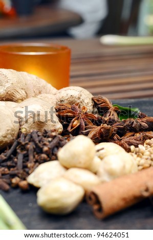 Various herbs and spices used in spa treatment in shallow depth of field.