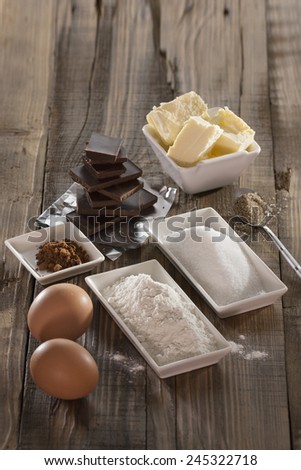 Ingredients for baking and pastry fondant recipe on wooden table