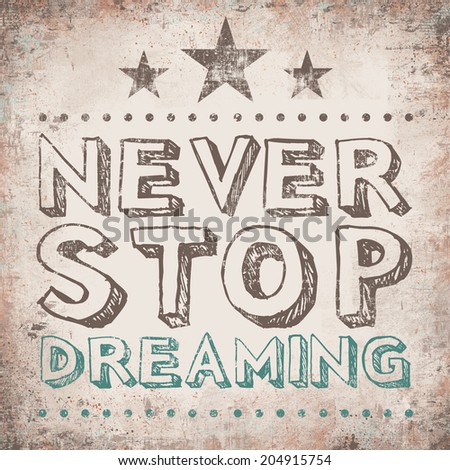Motivational Text never Stop Dreaming with grunge vintage background