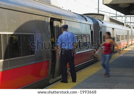 women commuter running for the train conductor at door