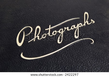stock photo : cover of a vintage photo album showing texture and the word 