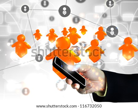 Businessman holding social network on smart phone .Technology concept