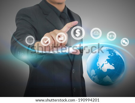 Businessman holding business world