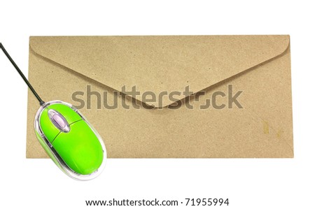 green computer mouse on old envelope isolated on white