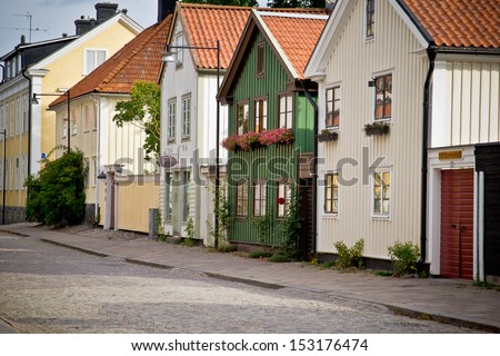 Street of cute houses in a town of northern Europe. Sweden