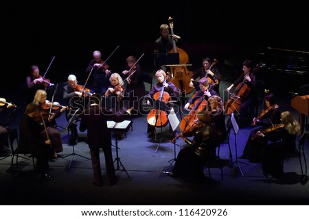 DNEPROPETROVSK, UKRAINE - OCTOBER 22: Four seasons Chamber Orchestra - main conductor Dmitry Logvin perform music of George Frideric Handel on October 22, 2012 in Dnepropetrovsk, Ukraine