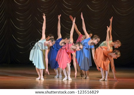DNEPROPETROVSK, UKRAINE - DECEMBER 30: Unidentified girls, ages 14-15 years old, perform dance \