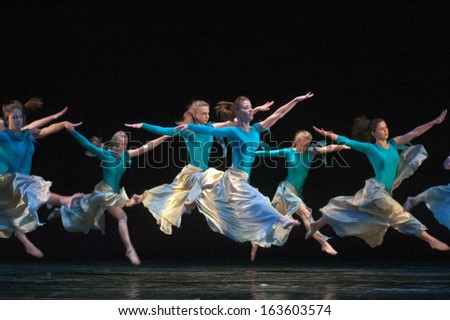 DNEPROPETROVSK, UKRAINE - MAY 18: Unidentified girls, ages 11-13 years old, perform FLOW at State Opera and Ballet Theatre on May 18, 2013 in Dnepropetrovsk, Ukraine
