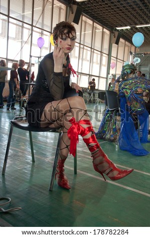 DNEPROPETROVSK, UKRAINE - MARCH 28: Model prepares backstage during the Championship on hairdressing, nail aesthetics and make YOUNG TALENTS OF UKRAINE on Mach 28, 2008 in Dnepropetrovsk, Ukraine