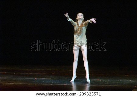DNIPROPETROVSK, UKRAINE - MAY 21: Sofia Gatylo, age 13 years old, performs DANCING RAIN at State Opera and Ballet Theatre on May 21, 2014 in Dnipropetrovsk, Ukraine