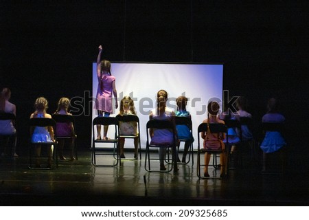 DNIPROPETROVSK, UKRAINE - MAY 21: Unidentified children, ages 6-13 years old, perform CINEMA at State Opera and Ballet Theatre on May 21, 2014 in Dnipropetrovsk, Ukraine