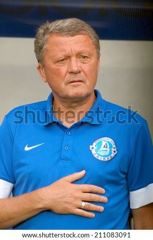 DNIPROPETROVSK, UKRAINE - AUGUST 10: Head Coach of Dnepr football club Miron Markevich looks on during Ukraine Championship match against FC Karpaty on August 10, 2014 in Dnipropetrovsk, Ukraine