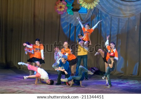 DNIPROPETROVSK, UKRAINE - May 22: Unidentified children, ages 11-14 years old, perform DANCING at the State Palace of children and youth on May 22, 2014 in Dnipropetrovsk, Ukraine