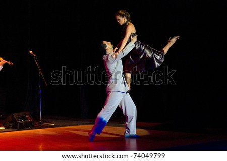 DNEPROPETROVSK, UKRAINE - MARCH 26: The dancers Gimena Aramburu and Juan Fossati (Argentina) at Stars of Argentine Tango show on March 26, 2011 in Dnepropetrovsk, Ukraine.