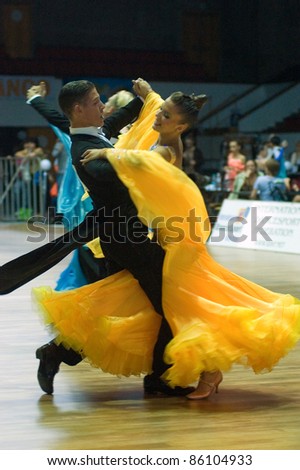 DNEPROPETROVSK, UKRAINE - SEPTEMBER 24: An unidentified dance couple in a dance pose during World Dance Competition DNEPR CUP 2011? on September 24, 2011 in Dnepropetrovsk, Ukraine.