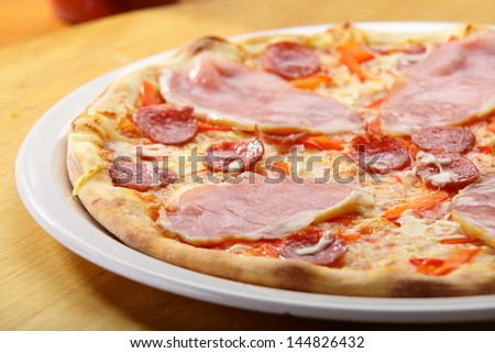 hot italian pizza with cheese and sauce