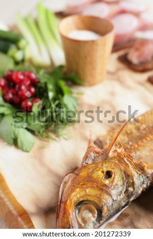 close up of salt fish on bright background