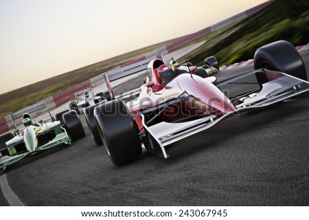 Red race car close up front view on a track leading the pack with motion Blur. Room for text or copy space