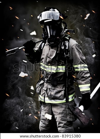 Aftermath , A firefighter Poses after a long fire fight with smoke,debris, and embers in the background. For more firefighter images please visit my profile.