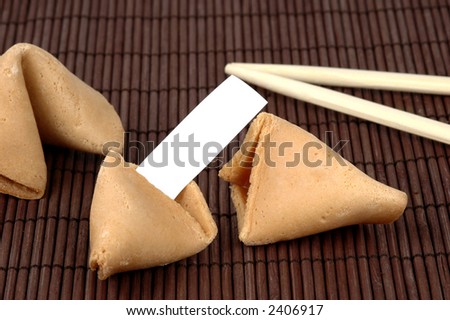 Broken fortune cookie with a blank fortune.