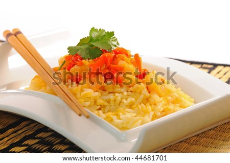 Oriental meal of rice with shrimp and pineapple.
