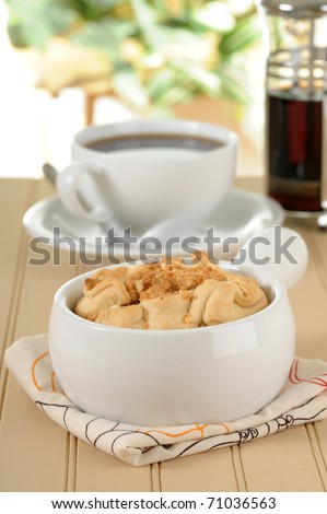Single serving of homemade apple pie and coffee.