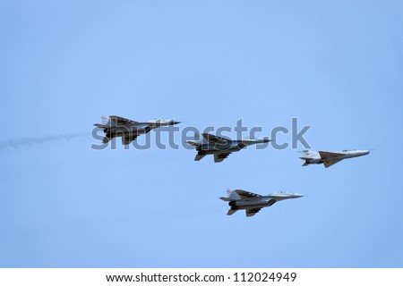 BELGRADE, SERBIA - SEPT 2: Serbian Air force MiG\'s flying in delta formation on air show \
