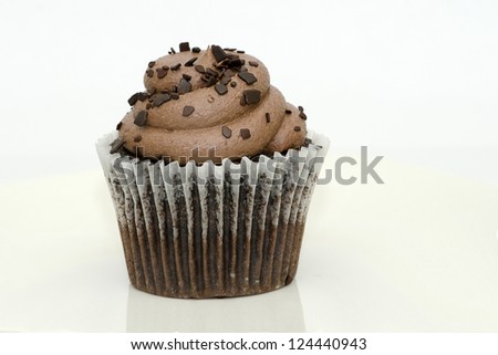 Chocolate Cupcake isolated on white background, with reflection