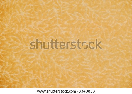 tan leaf motif on fabric for background texture