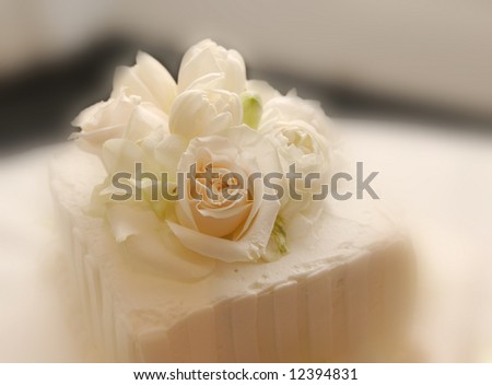 wedding cakes with flowers on top. stock photo : top of wedding cake for dessert, with flowers