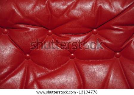 red leather couch detail