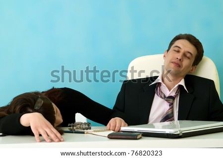 Business people sleep in office