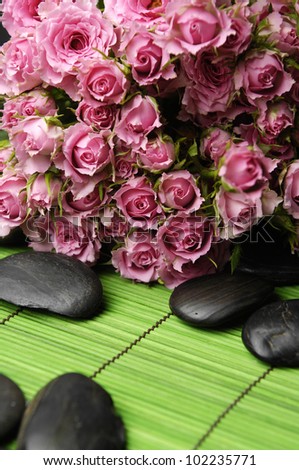 Big Roses Bouquet and pebble on bamboo mat