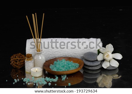 Spa feeling with towel , Fragrance sticks or Scent diffuser ,salt in bowl ,candle , pebbles, orchid