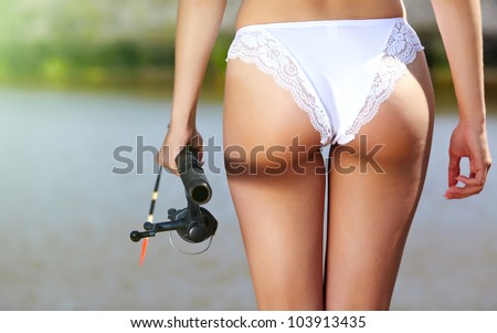 sexy woman fishing.  back view