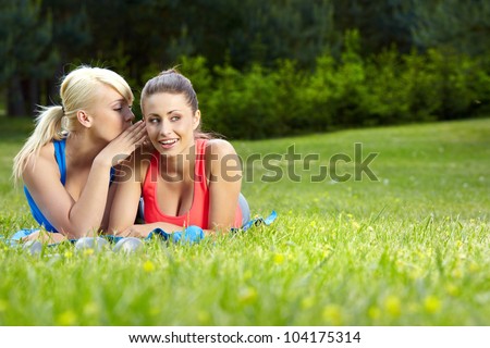 Portrait of two fitness woman having fun in summer environment
