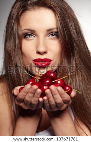 Woman with cherries