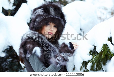 Winter wild woman on snow