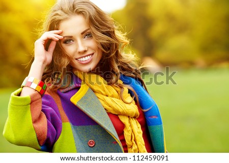 Fashion Woman Walking In Autumn Park