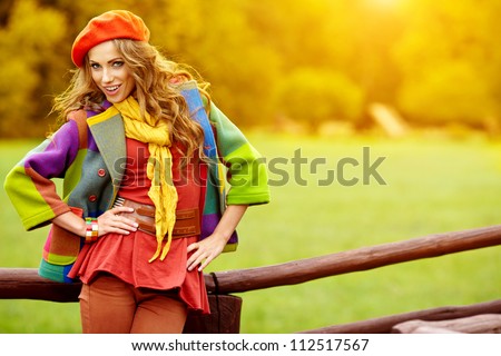 Fashion woman  walking in autumn park