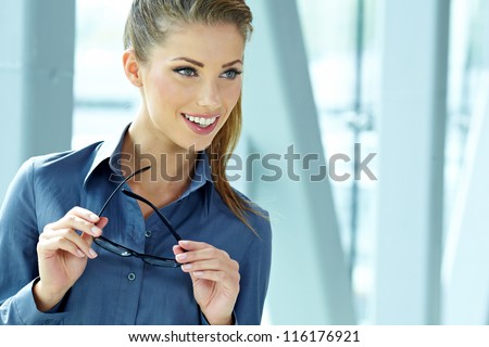 business woman in modern glass interior
