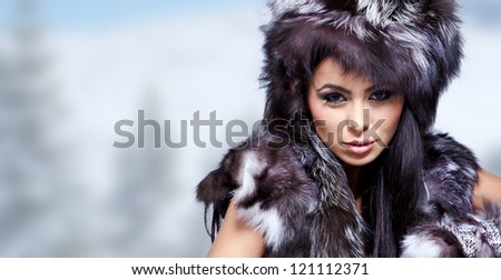 Winter wild woman on snow