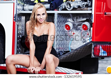 Sexy  woman and fire truck