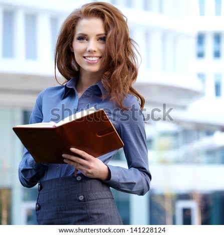 Young happy women or student on the property bussines background