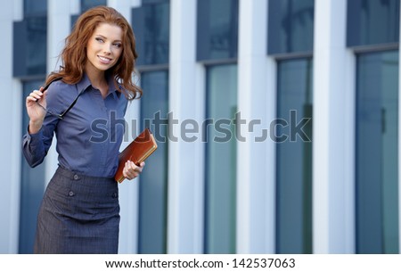 Young happy women or student on the property business background