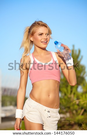 girl in sport on the nature .space for cover text