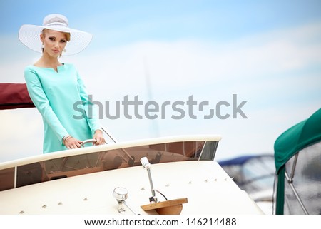 Summer woman on a yacht