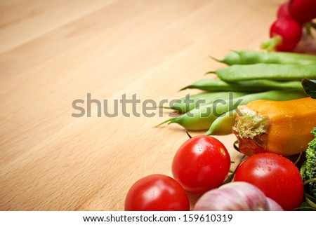 Healthy Organic Vegetables on a Wooden Background. Art Border Design